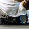 Roller fitness do masażu ciała, średnio twardy, wałek z wypustkami, czarny